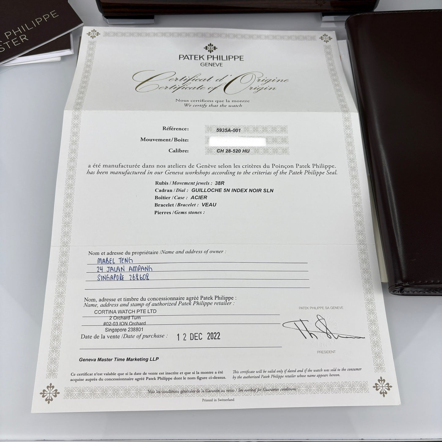 Patek Philippe 5935A-001 — World Time Flyback Chronograph | Steel & Salmon Dial