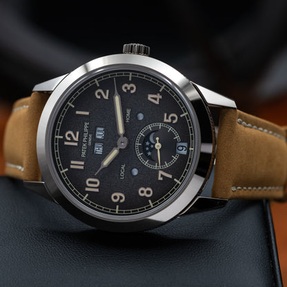Patek Philippe Annual Calendar Travel Time — White Gold | Charcoal Dial | Ref. 5326G-001 | 2026