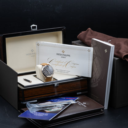 Patek Philippe Annual Calendar Travel Time — White Gold | Charcoal Dial | Ref. 5326G-001 | 2026