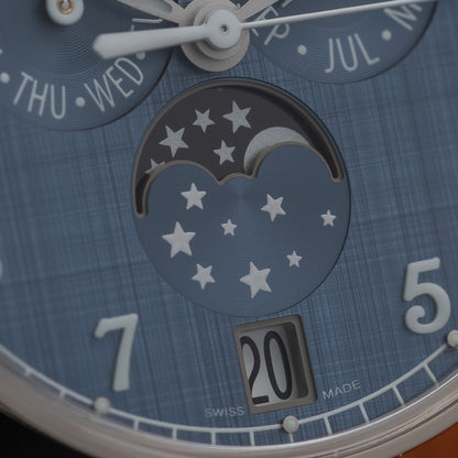 Patek Philippe Annual Calendar Moon Phases — White Gold | Blue-Gray Shantung Dial | Ref. 4946G-001 | 2026