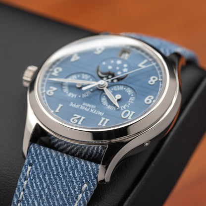 Patek Philippe Annual Calendar Moon Phases — White Gold | Blue-Gray Shantung Dial | Ref. 4946G-001 | 2026