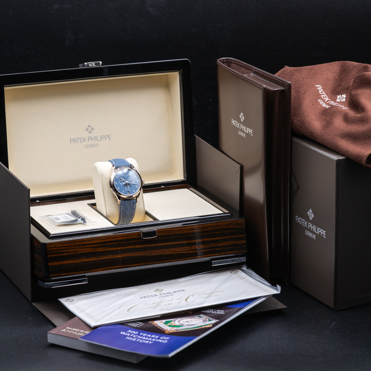 Patek Philippe Annual Calendar Moon Phases — White Gold | Blue-Gray Shantung Dial | Ref. 4946G-001 | 2026