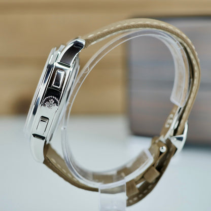 Patek Philippe 5935A-001 — World Time Flyback Chronograph | Steel & Salmon Dial